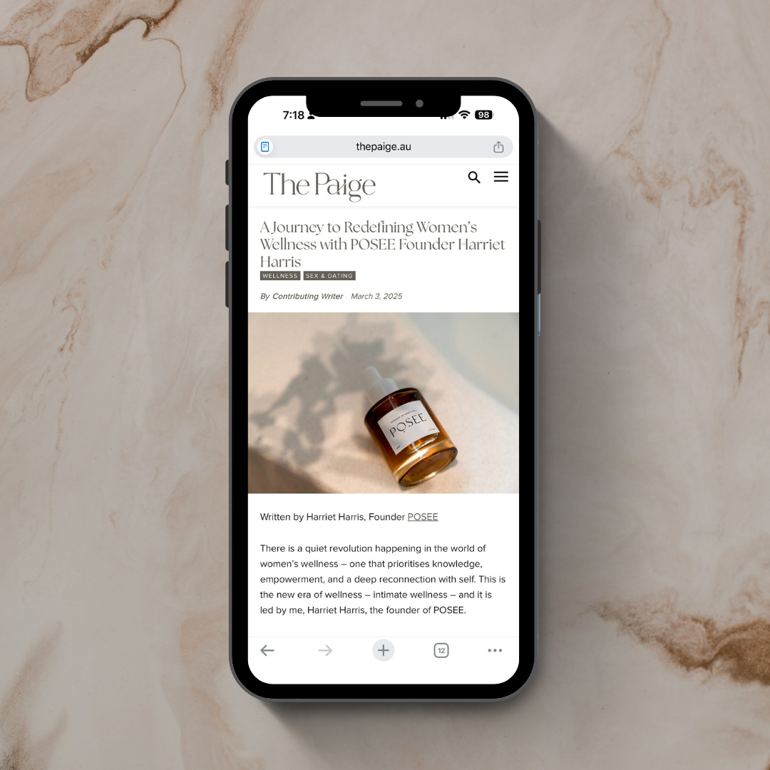 Smartphone displaying a magazine article on a marble surface